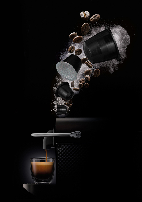 Photography showing the NX capsules with coffee machine for Dualit
